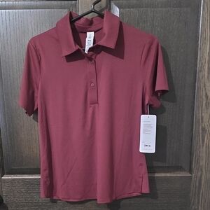 RHONE Women's Burgundy Course To Court Polo Shirt
